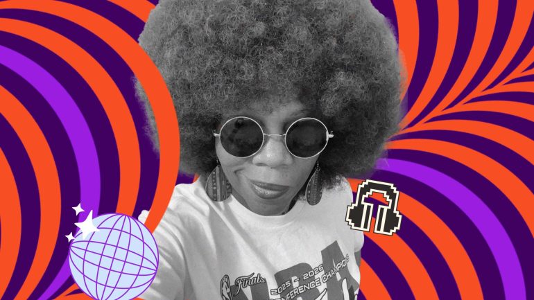 A person with a large afro hairstyle and round sunglasses smiles at the camera. They wear a white T-shirt with graphics and text, including "Jr Tech" and "2023". The background features a vibrant, swirling pattern in red, purple, and black, with graphics of a disco ball and pixelated headphones.