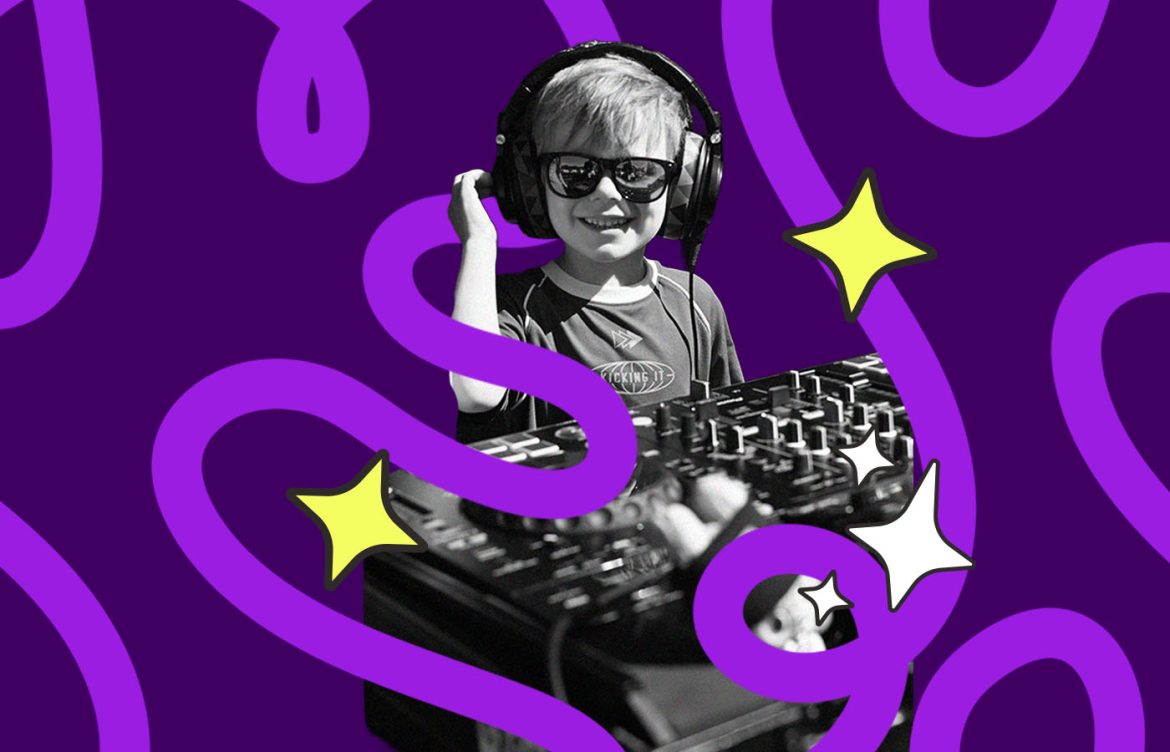 A person wearing headphones and sunglasses is standing behind a DJ mixer, smiling. The shirt has the text "Kicking It." The image is overlayed with purple swirls and yellow star designs.